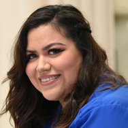 Respiratory Care student smiling in a blue shirt
