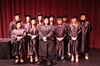 2025 GED Graduates in their caps and gowns on stage