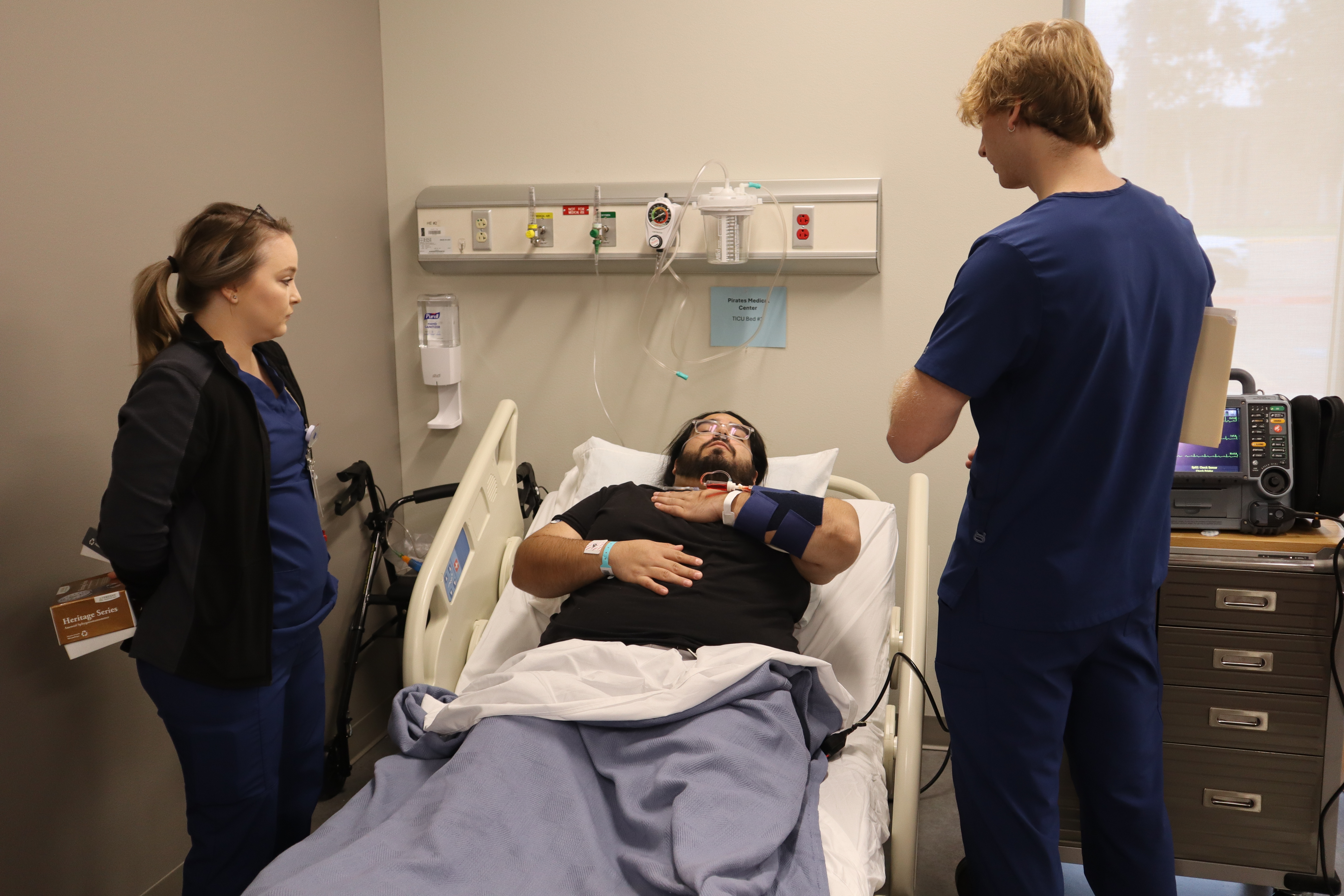 Physical therapy assistant students work with a volunteer patient