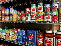 Rows of canned goods in JP's Market at Victoria College