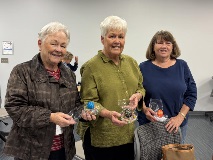 Three women at an academy of lifelong learning class