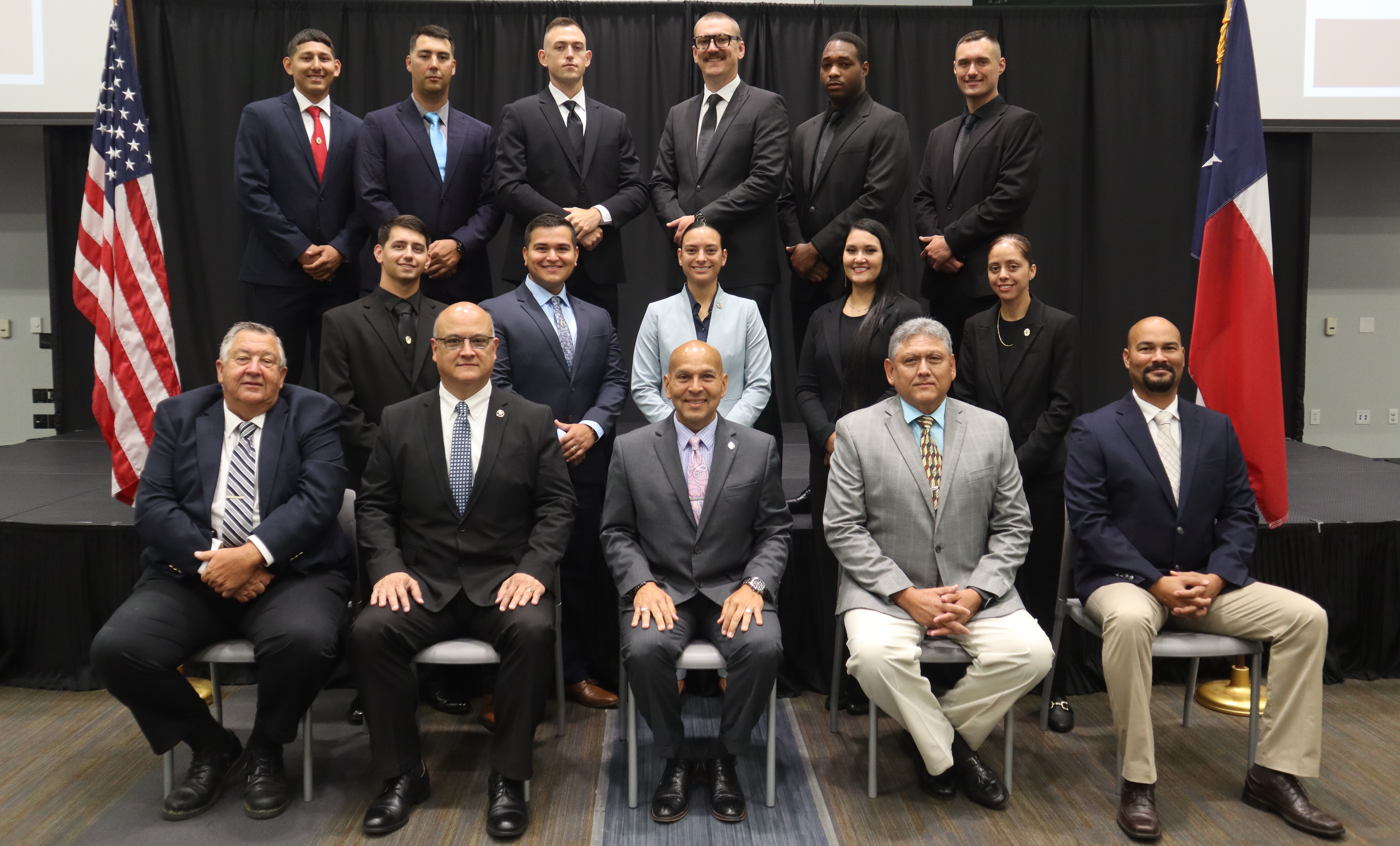 VC cadet graduates with instructors and leadership